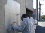 painting out graffiti 
